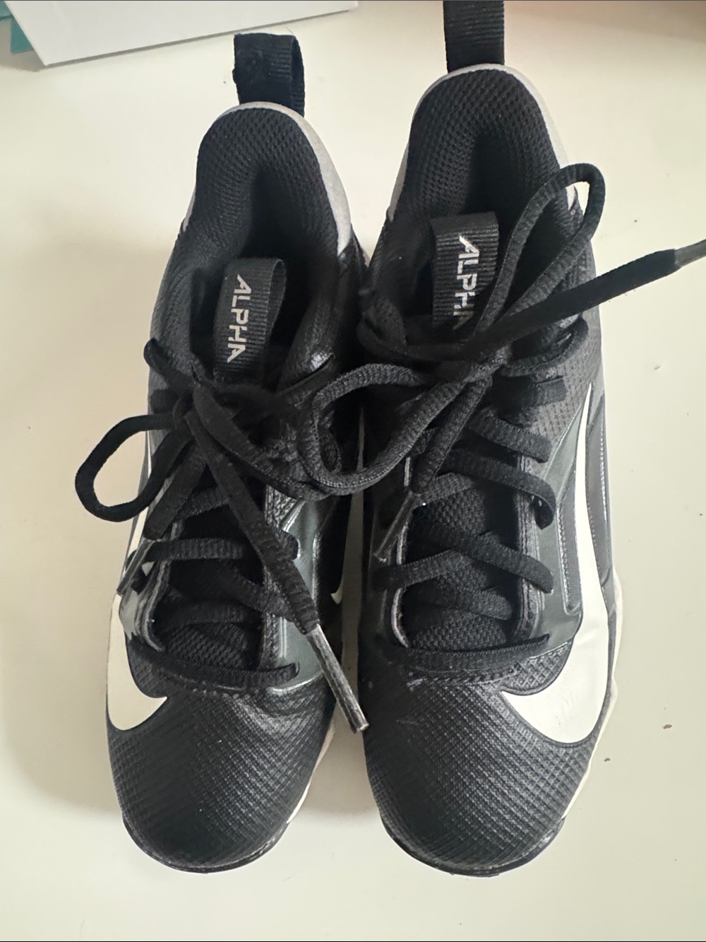 Nike Alpha Men’s Black and White Athletic Shoes